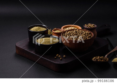 Spice dried dill or basil in the form of green powder 99186186