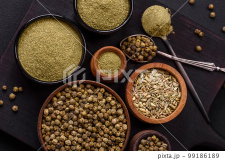 Spice dried dill or basil in the form of green powder 99186189