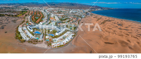 Hotel Riu Palace from above. Luxury grand accommodation with beautiful scenery of the famous desert dunes. 99193765