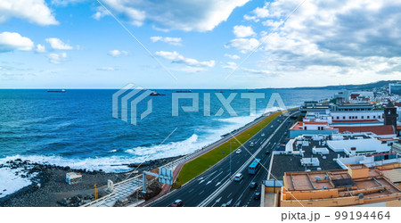 Panoramic aerial view of Las Palmas de Gran Canaria and Las Canteras beach at sunset, Canary Islands, Spain. Panoramic aerial view of Las Palmas de Gran Canaria and Las Canteras beach at sunset, Canary Islands, Spain. 99194464