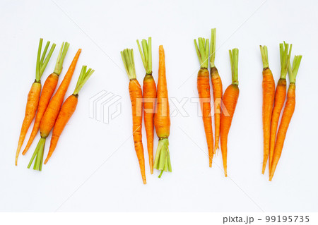Fresh carrots on white background. 99195735