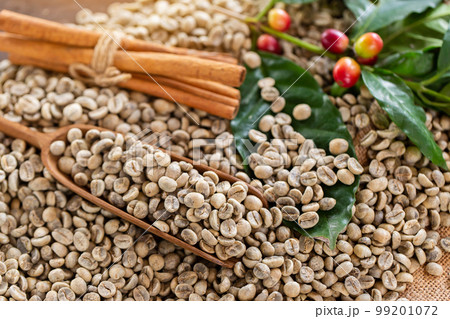 Coffee beans. On a wooden background rotation Coffee beans. On a wooden background rotation 99201072