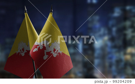 Small flags of the Bhutan on an abstract blurry background Small flags of the Bhutan on an abstract blurry background 99204209