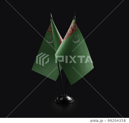Small national flags of the Turkmenistan on a black background Small national flags of the Turkmenistan on a black background 99204358