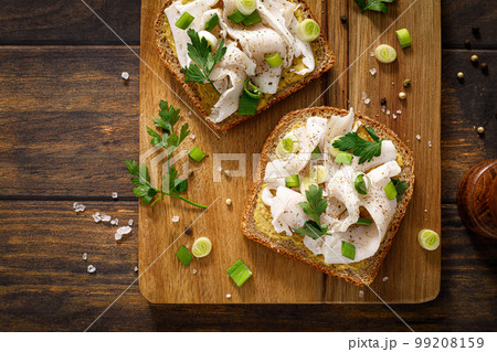 Lard sandwich. Ukraine salo with bread. Traditional Ukrainian food. Sandwich with salted lard. National ukrainian cuisine 99208159