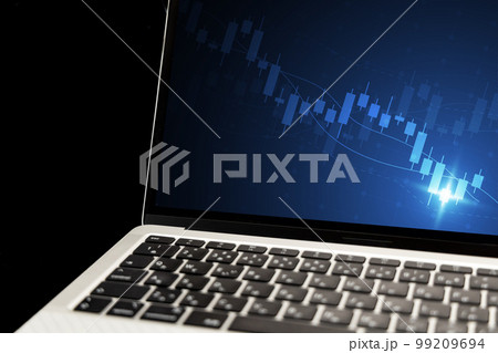 経済イメージ ノートパソコンとチャート 経済イメージ ノートパソコンとチャート 99209694