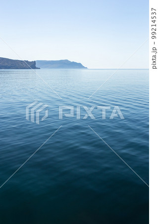 Beautiful calm summer sea Landscape with deep blue water Beautiful calm summer sea Landscape with deep blue water 99214537