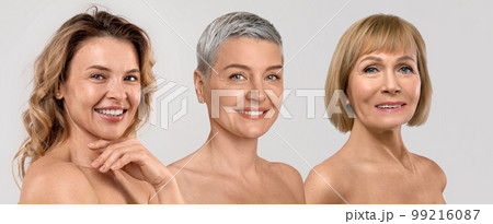 Middle aged and elderly ladies posing half-naked on studio background Middle aged and elderly ladies posing half-naked on studio background 99216087