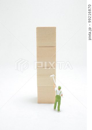 a little painter figure and business icons on cubes 99216870