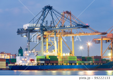 Cargo ship loading cargo container with crane at port. 99222133