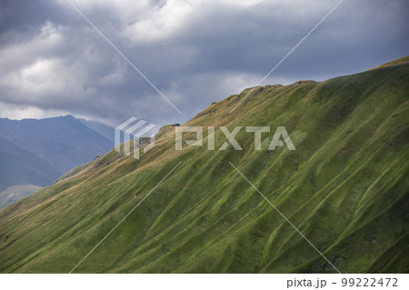 Mountains covered with moss against the blue sky. Mountains covered with moss against the blue sky. 99222472