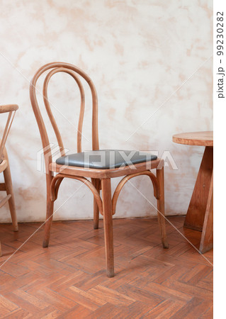 Vintage wooden chair in coffee shop Vintage wooden chair in coffee shop 99230282