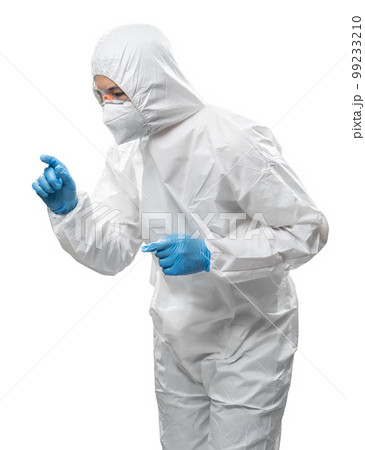 Worker wears medical protective suit or white coverall suit with mask and goggles Worker wears medical protective suit or white coverall suit with mask and goggles 99233210