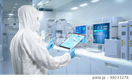 Worker or engineer wears protective suit or coverall suit work in semiconductor manufacturing factory Worker or engineer wears protective suit or coverall suit work in semiconductor manufacturing factory 99233276