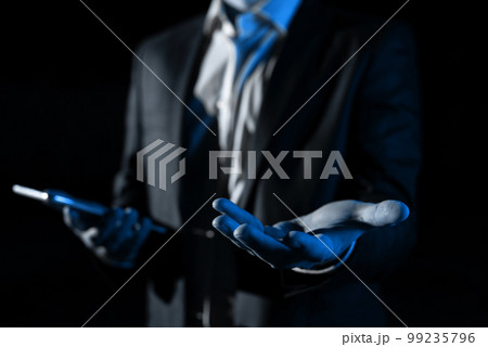 Man Holding Mobile Phone and Holding On Recent Updates With One Hand. Businessman Having Virtual Reality Eyeglasses, Cellphone And Presenting New Idea. 99235796