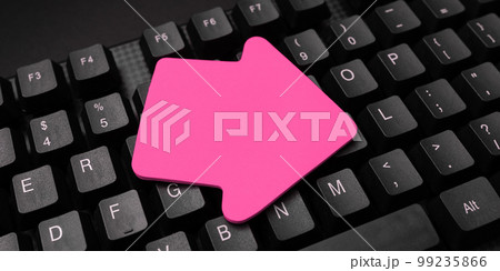 Colored sticker lying on black keyboard. Important information written over paper. Image with school supplies. Multiple Assorted Collection Office Stationery. Colored sticker lying on black keyboard. Important information written over paper. Image with school supplies. Multiple Assorted Collection Office Stationery. 99235866