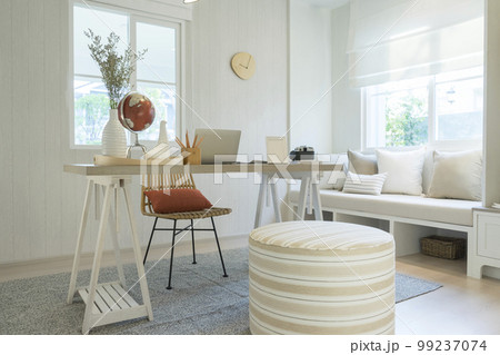 Workplace with laptop on the white wood table against window. Workplace at home 99237074