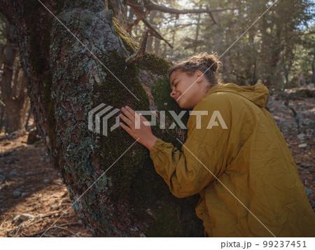 caucasian woman enjoys being in nature, caucasian woman enjoys being in nature, 99237451