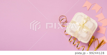 Bento cake pink background. little dessert cake for gift. Korean style cakes in box for one person Bento cake pink background. little dessert cake for gift. Korean style cakes in box for one person 99244128