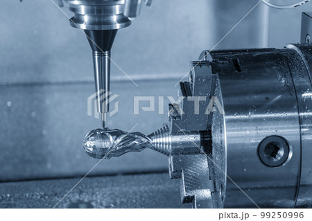 The 4-axis CNC milling machine cutting the sample part with solid ball end mill tool. The 4-axis CNC milling machine cutting the sample part with solid ball end mill tool. 99250996