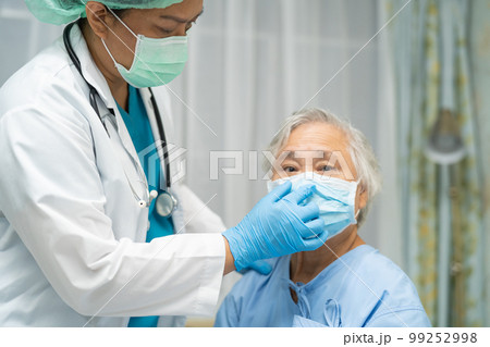 Asian senior or elderly old lady woman patient wearing a face mask new normal in hospital for protect safety infection Covid19 Coronavirus. Asian senior or elderly old lady woman patient wearing a face mask new normal in hospital for protect safety infection Covid19 Coronavirus. 99252998