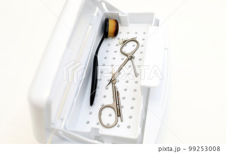nail manicure tool sterilizer box, plastic sterilization tray, closeup sanitizing machine. Safe manicure, pedicure in beauty salon. Hardware manicure nozzles, scissors, brush. Horizontal, copy space nail manicure tool sterilizer box, plastic sterilization tray, closeup sanitizing machine. Safe manicure, pedicure in beauty salon. Hardware manicure nozzles, scissors, brush. Horizontal, copy space 99253008