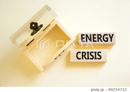 Global energy crisis symbol. Concept words Energy crisis on wooden blocks. Beautiful white table white background. Empty wooden chest. Business global energy crisis concept. Copy space. Global energy crisis symbol. Concept words Energy crisis on wooden blocks. Beautiful white table white background. Empty wooden chest. Business global energy crisis concept. Copy space. 99254732