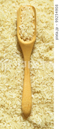 Fresh organic white raw rice grains texture and...の写真素材 [99254908] - PIXTA