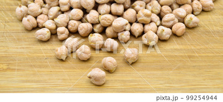 Very nutritious and a pile of fresh dry chickpeas 99254944