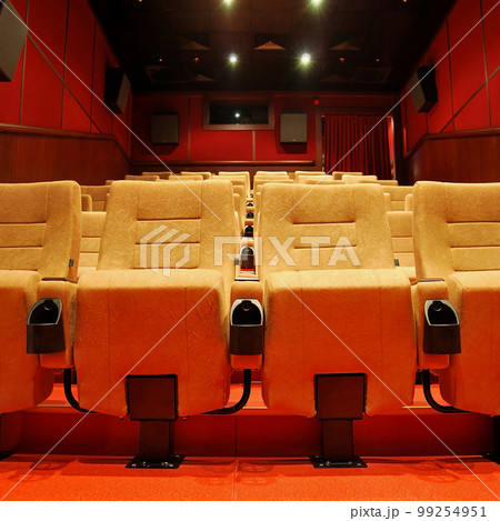 Modern cinema hall empty and beige comfortable seats 99254951