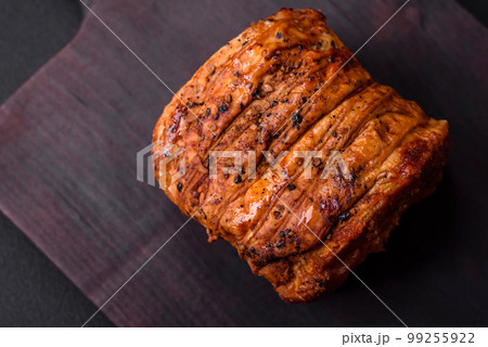 Delicious fresh smoked meat or ham with spices and herbs Delicious fresh smoked meat or ham with spices and herbs 99255922