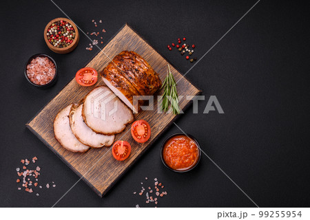 Delicious fresh smoked meat or ham with spices and herbs 99255954