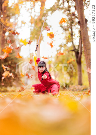 martial arts mid latin woman wushu kung-fu sword. healthy wellness active training. argentinean. martial arts mid latin woman wushu kung-fu sword. healthy wellness active training. argentinean. 99257222