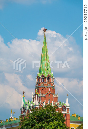 Troitskaya tower of Moscow Kremlin on a blue sky background in sunny summer day 99257719
