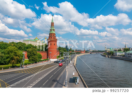 View of Kremlin with Vodovzvodnaya tower, Grand Kremlin Palace from repaired Bolshoy Kamenny Bridgein Moscow city on sunny summer day 99257720