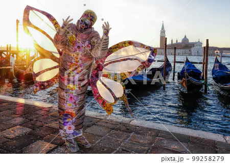 Colorful carnival masks at a traditional festival in Venice, Italy Colorful carnival masks at a traditional festival in Venice, Italy 99258279