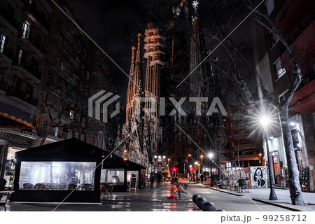 Night view of the La Sagrada Familia cathedral. Impressive cathedral designed and unfinished by Gaudi in the center of Barcelona. Night view of the La Sagrada Familia cathedral. Impressive cathedral designed and unfinished by Gaudi in the center of Barcelona. 99258712
