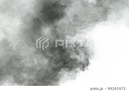Black particles splattered on white background. Black powder dust splashing. Black particles splattered on white background. Black powder dust splashing. 99265072