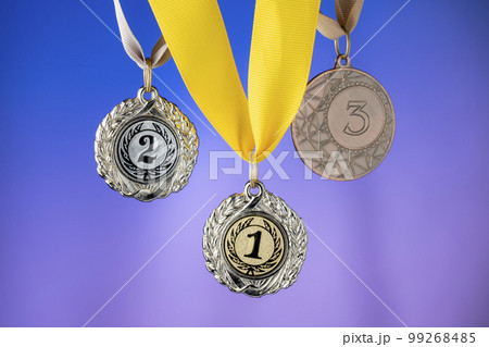 Sports awards, medals on a multi-colored background, copy space, space for text blank for design, close-up 99268485