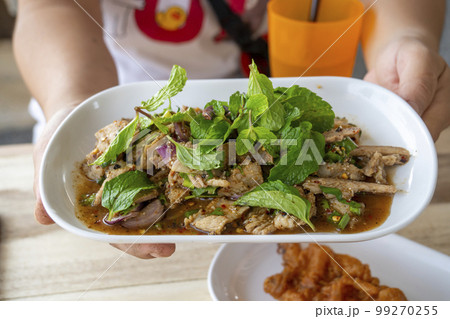 Spicy Grilled Pork Salad (Moo Yang Nam Tok) Spicy Grilled Pork Salad (Moo Yang Nam Tok) 99270255