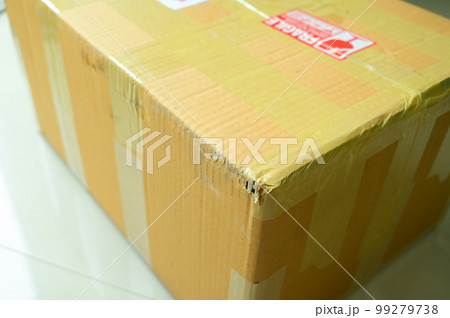 brown box packaging with warning symbol brown box packaging with warning symbol 99279738