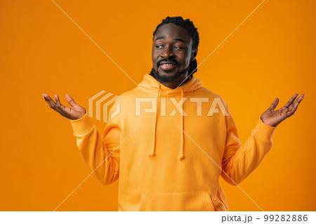 Portrait of happy black man with hands raised up 99282886