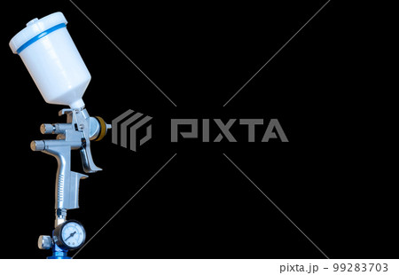 Paint spray on wooden floors Image of the painter's arm hand holding industrial size spray gun used for industrial painting and coating and isolated on background clipingpart Paint spray on wooden floors Image of the painter's arm hand holding industrial size spray gun used for industrial painting and coating and isolated on background clipingpart 99283703