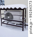 The outdoor unit of the air conditioner (air-to-air heat pump) in the snow during winter operation. 99284373