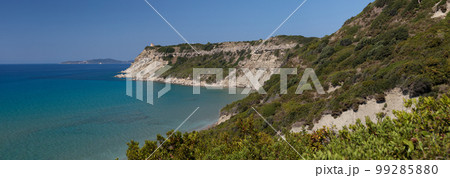 Beautiful beach on the Greek island of Corfu, blue lagoon, natural colours. Beautiful beach on the Greek island of Corfu, blue lagoon, natural colours. 99285880