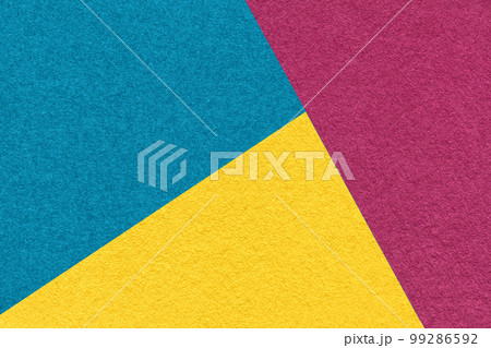 Texture of craft yellow, purple and blue shade color paper background, macro. Vintage abstract turquoise cardboard 99286592