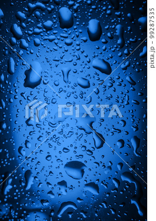 close up. drops of water on a glass of water close up. drops of water on a glass of water 99287535