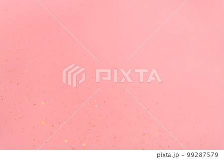 pink abstract background with flying gold sequins pink abstract background with flying gold sequins 99287579