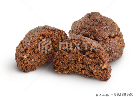 chocolate cookie with kerob, banana, cashew, sunflower seeds and coconut paste isolated on white background. Healthy food, gluten-free, flour-free 99289930