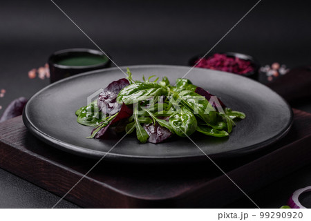 Delicious fresh salad consisting of spinach, chard, radicchio, red chart Delicious fresh salad consisting of spinach, chard, radicchio, red chart 99290920